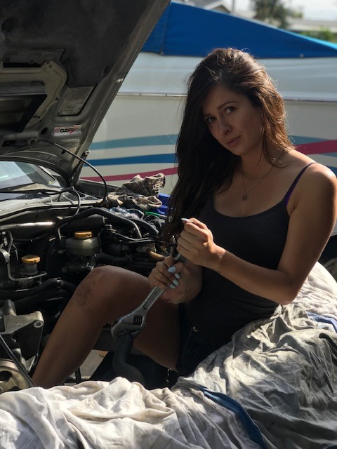 My gf making sure this hose is torqued to spec, just like a real car model! Lol